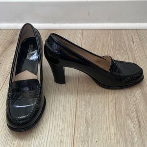 Black patent leather Michael Kors Oxford pumps